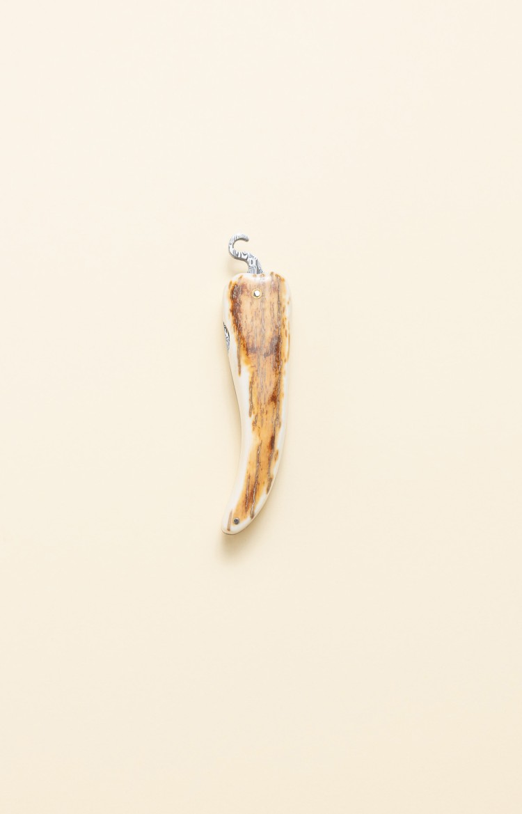 Photo de Bixia, couteau artisanal basque en ivoire de mammouth et lame damas, lame fermée